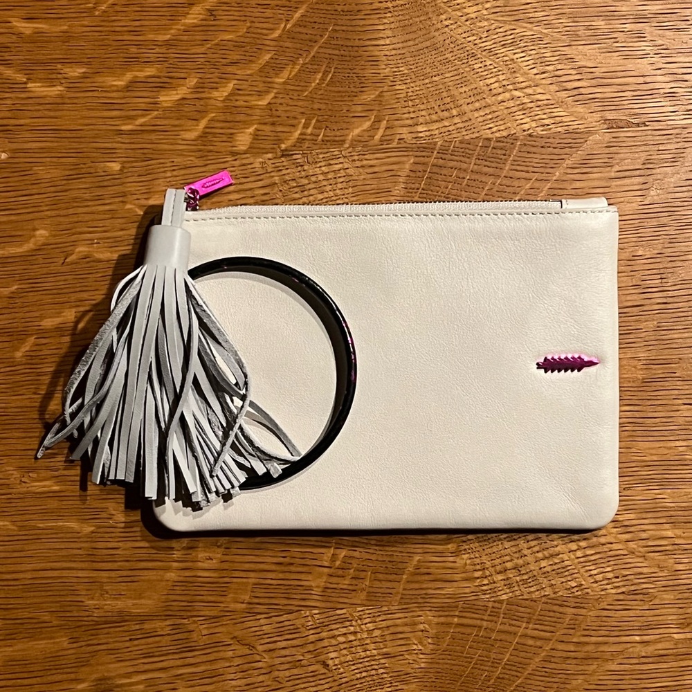 Stylish White Wristlet with Tassel Accent
